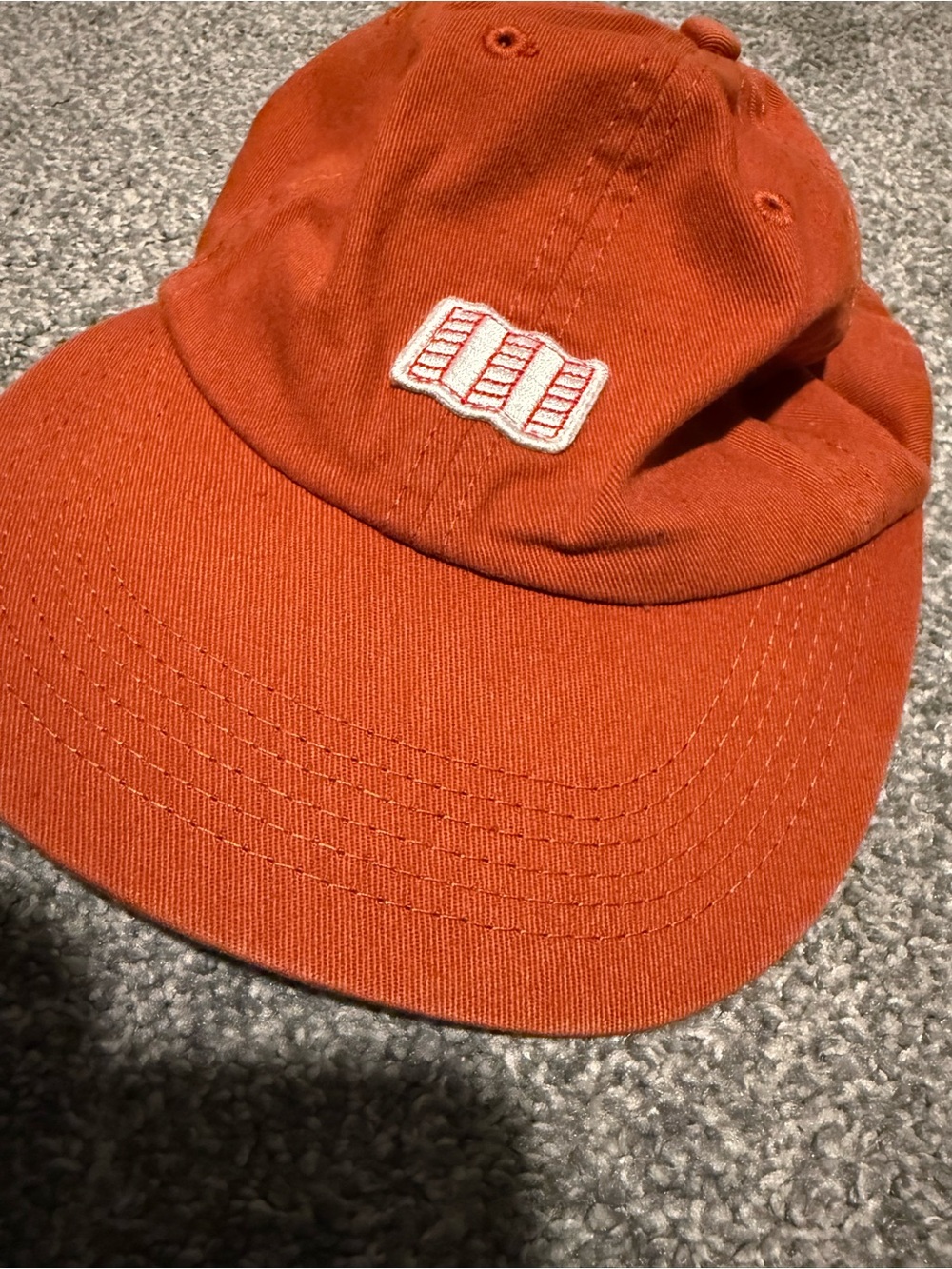 Topo Designs Rust Orange Baseball Hat with Black Trim
